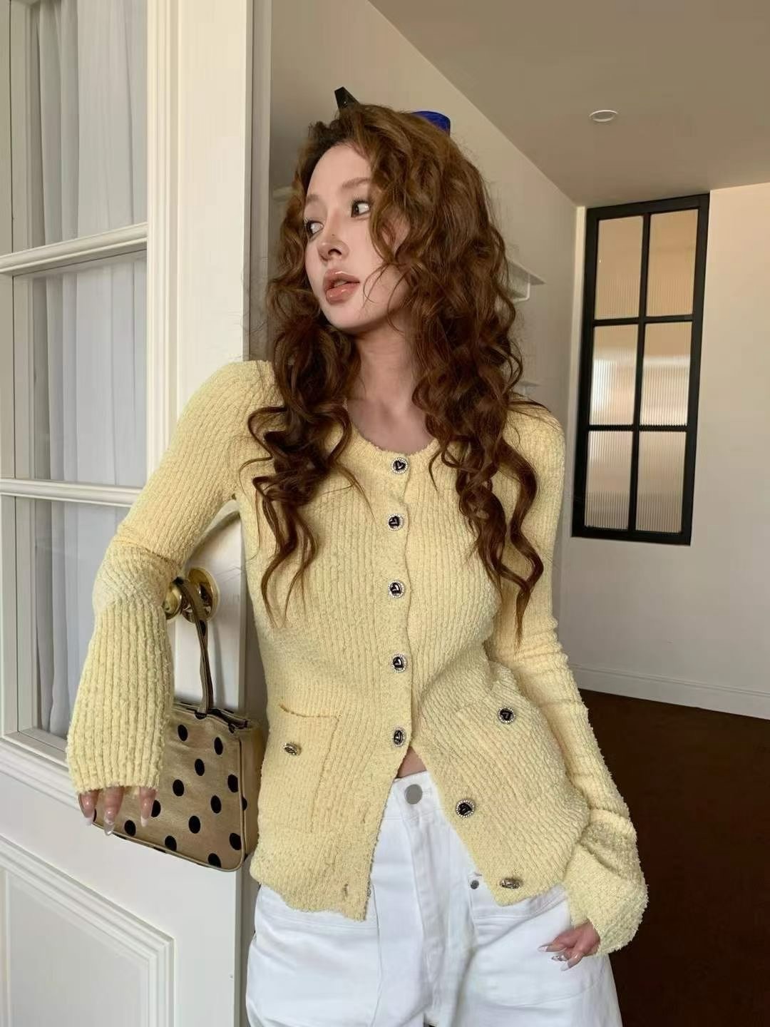 愛心釦坑紋雙口袋長版針織