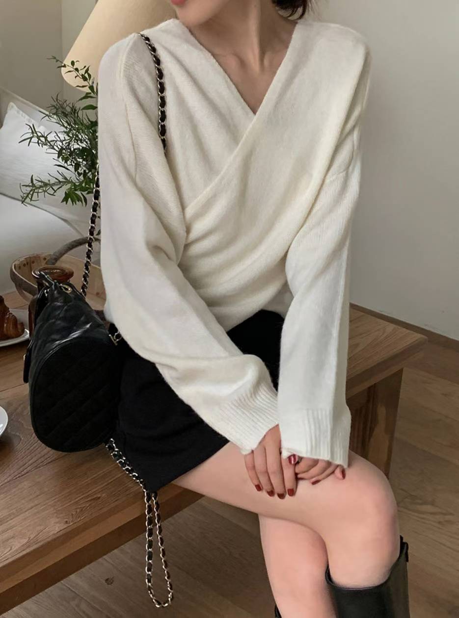 素色交錯造型織衫