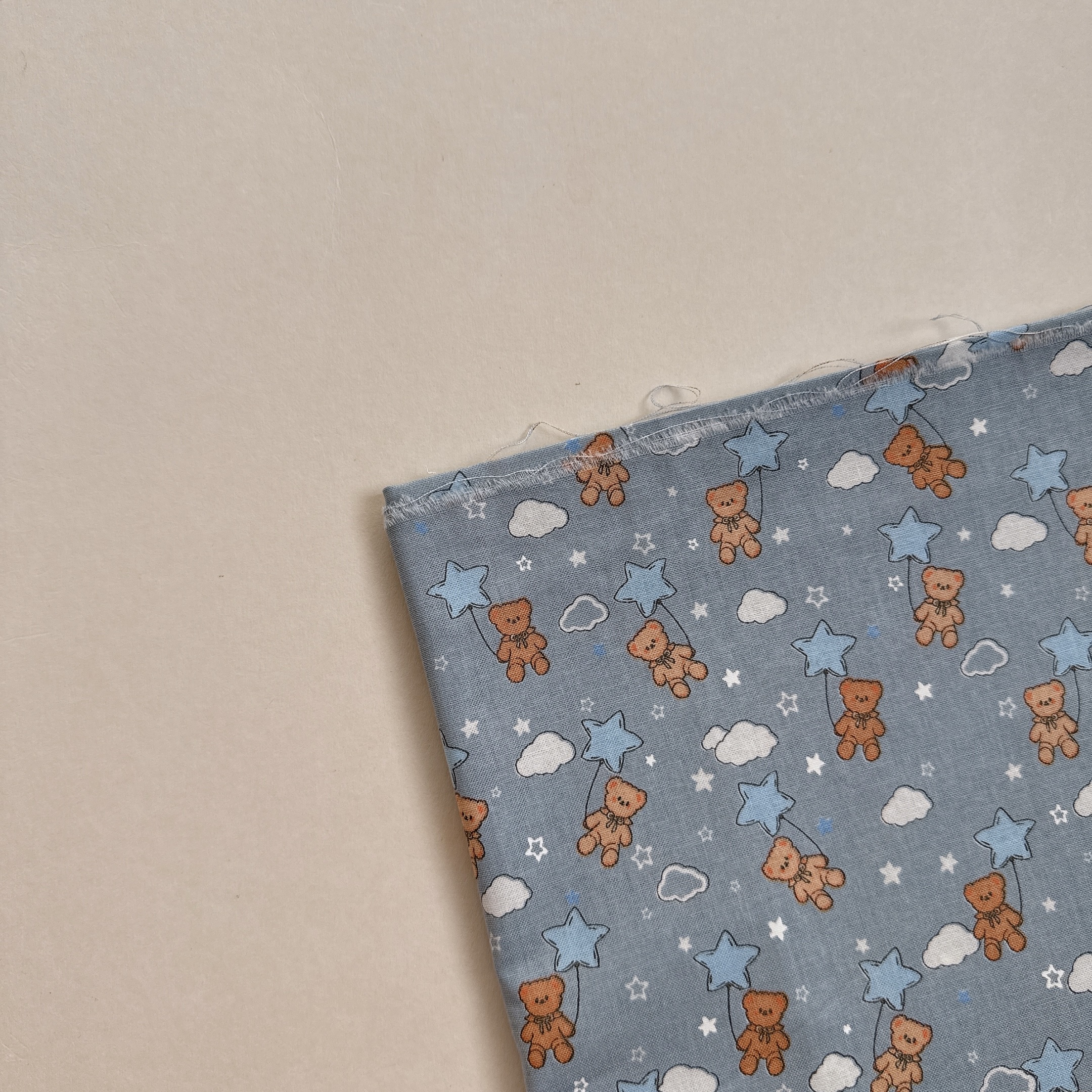 【 選布 】星星泰迪藍底63