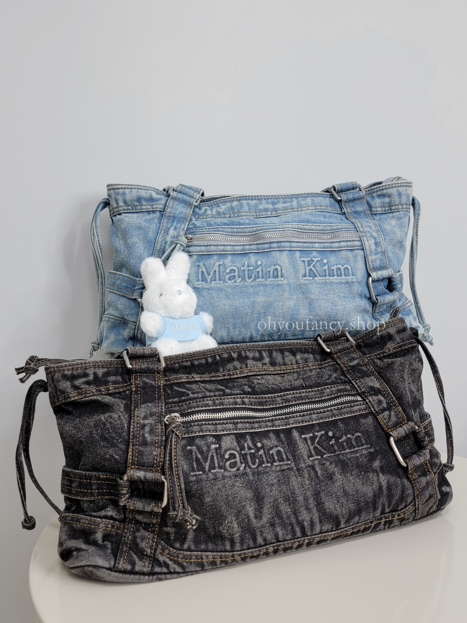 ● MATIN KIM ● MATIN WASHED DENIM SQUARE BAG MATIN WASHED DENIM SQUARE BAG IN LIGHT BLUE – Matin Kim