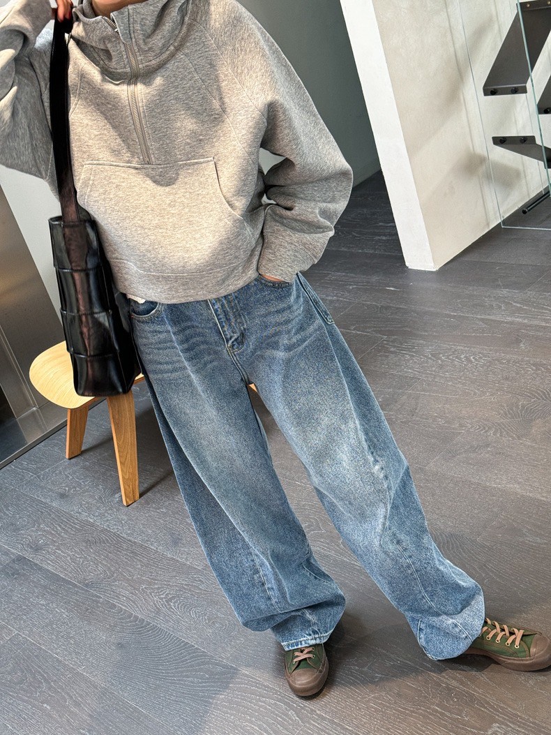 秋冬立體斜裁弧形毛邊寬腿牛仔褲