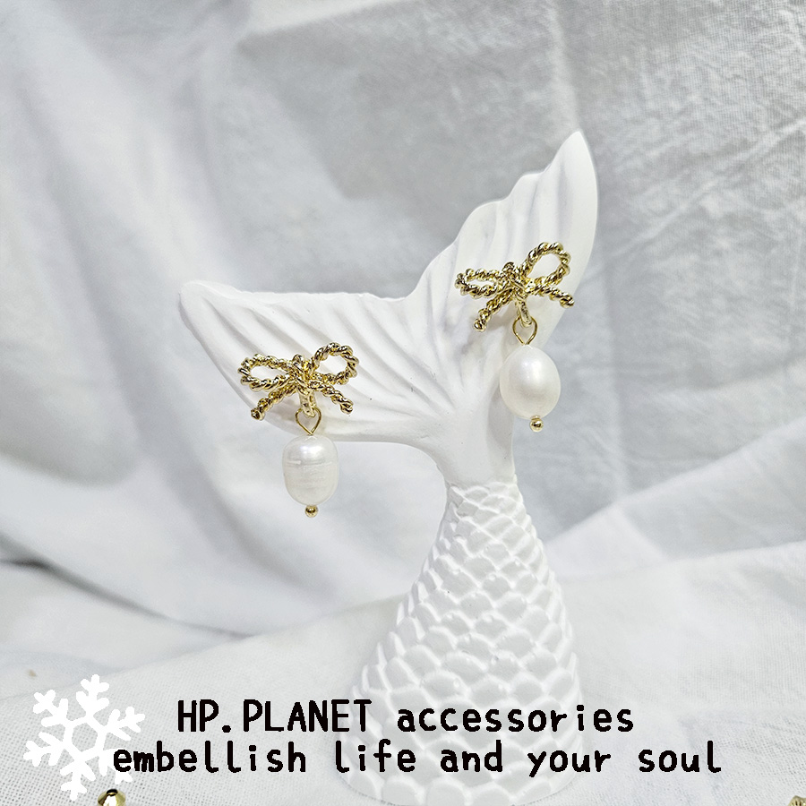 簡約扭轉蝴蝶結珍珠925銀針耳環