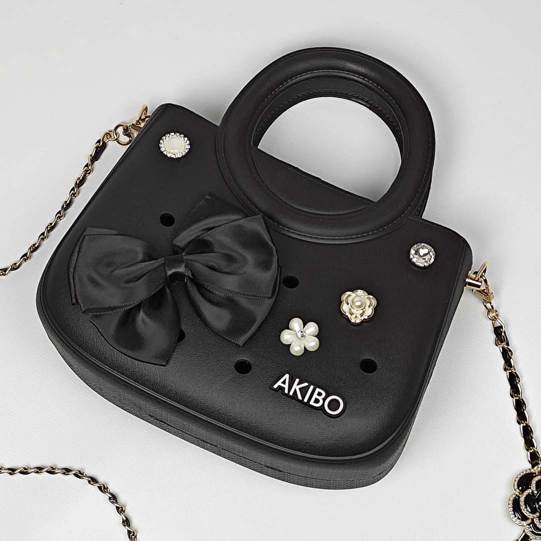 AKIBO滿月包-經典黑/皮革花漾背帶(肩背手提洞洞包。中性款、輕量、防水)