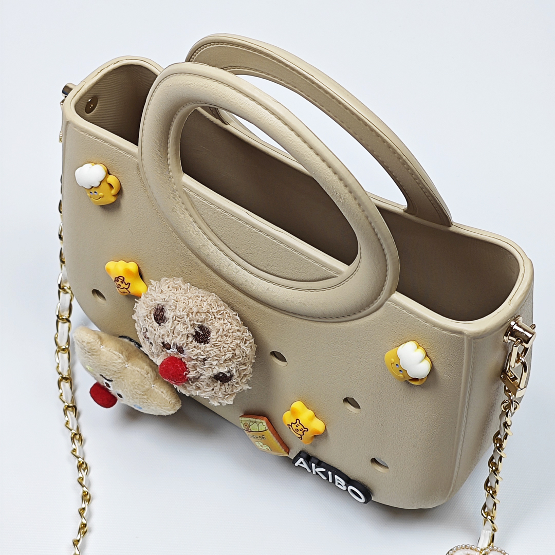 AKIBO滿月包-奶油白/皮革花漾背帶(肩背手提洞洞包。中性款、輕量、防水)