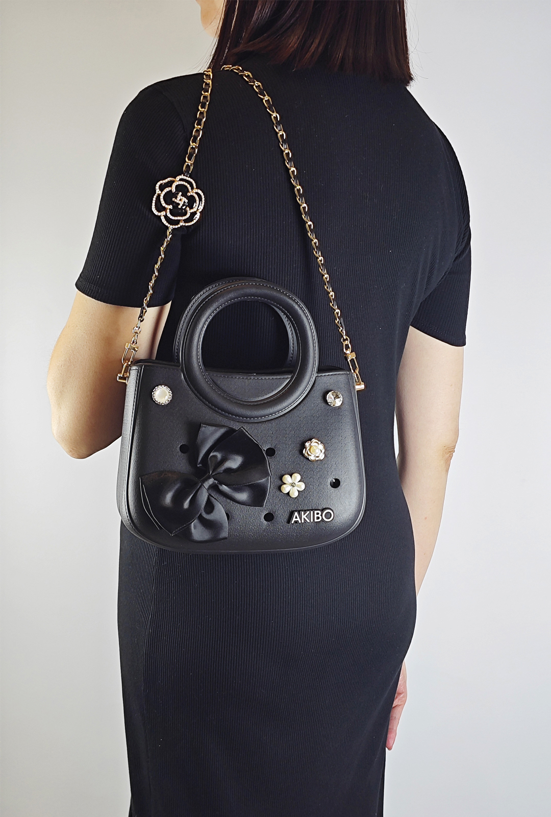 AKIBO滿月包-經典黑/皮革花漾背帶(肩背手提洞洞包。中性款、輕量、防水)