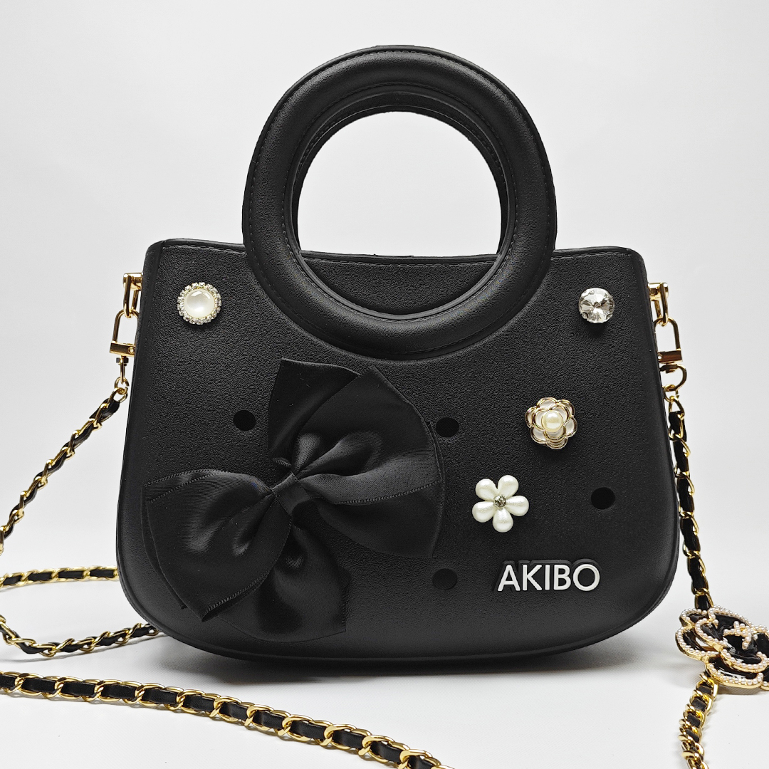 AKIBO滿月包-經典黑/皮革花漾背帶(肩背手提洞洞包。中性款、輕量、防水)