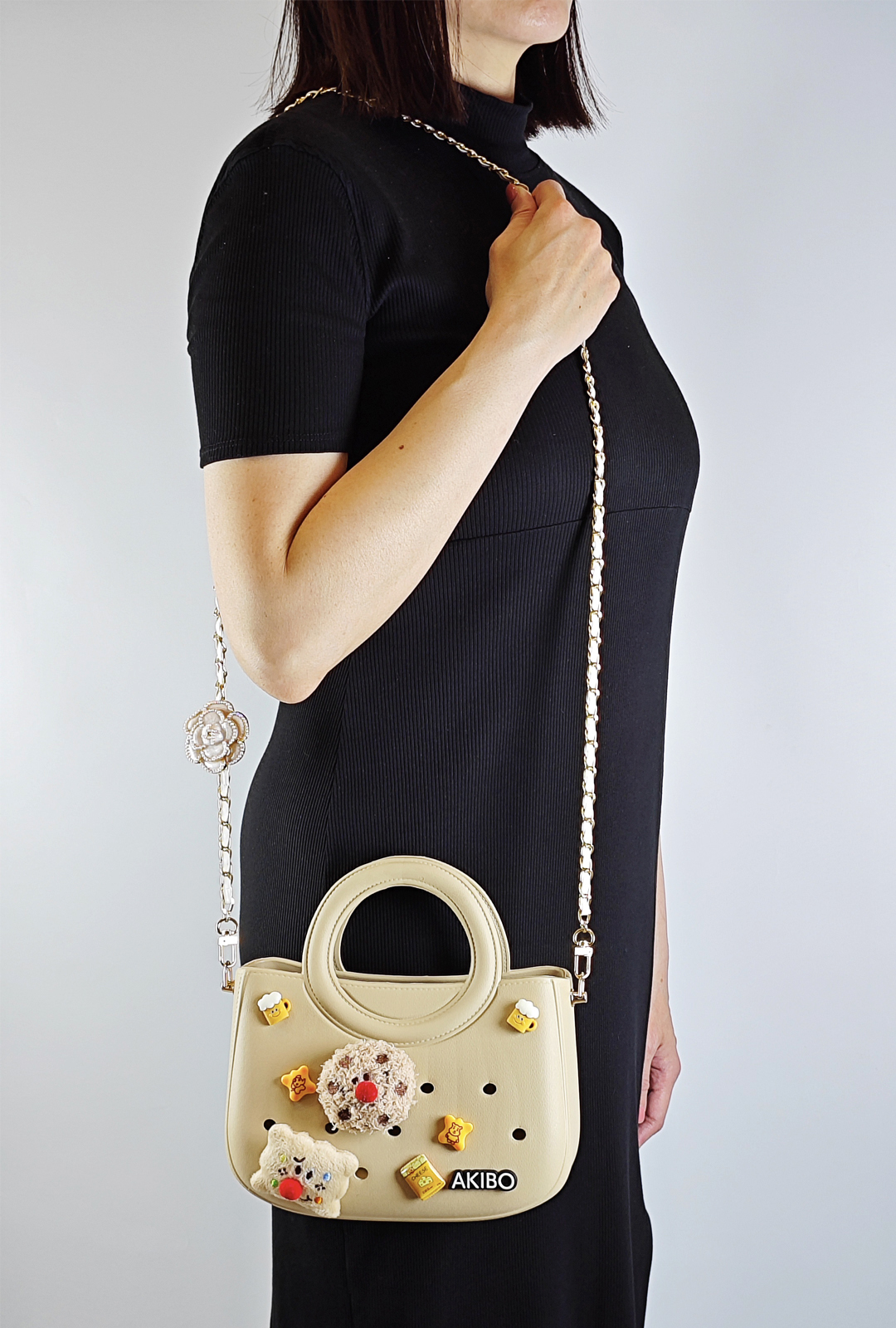 AKIBO滿月包-奶油白/皮革花漾背帶(肩背手提洞洞包。中性款、輕量、防水)