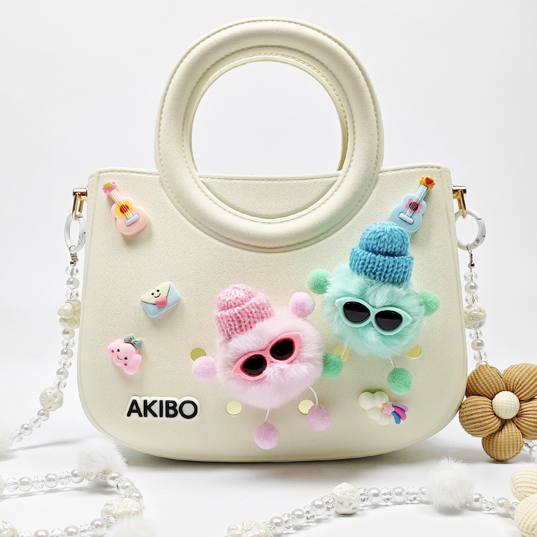 AKIBO滿月包-牛奶白/珠光雪羽背帶(肩背手提洞洞包。中性款、輕量、防水) 