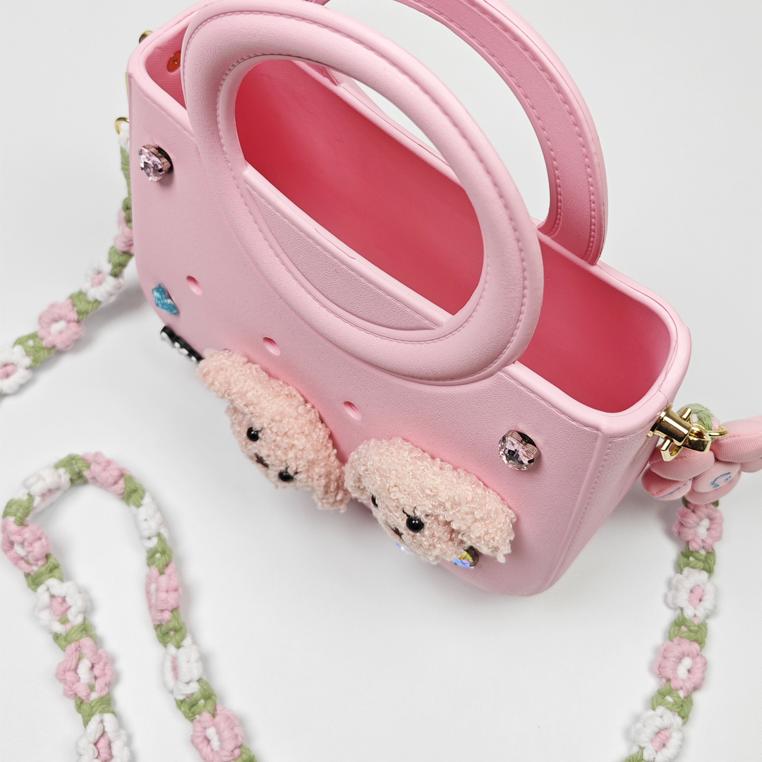 AKIBO滿月包-櫻花粉/手工編織花朵背帶(肩背手提洞洞包。中性款、輕量、防水)