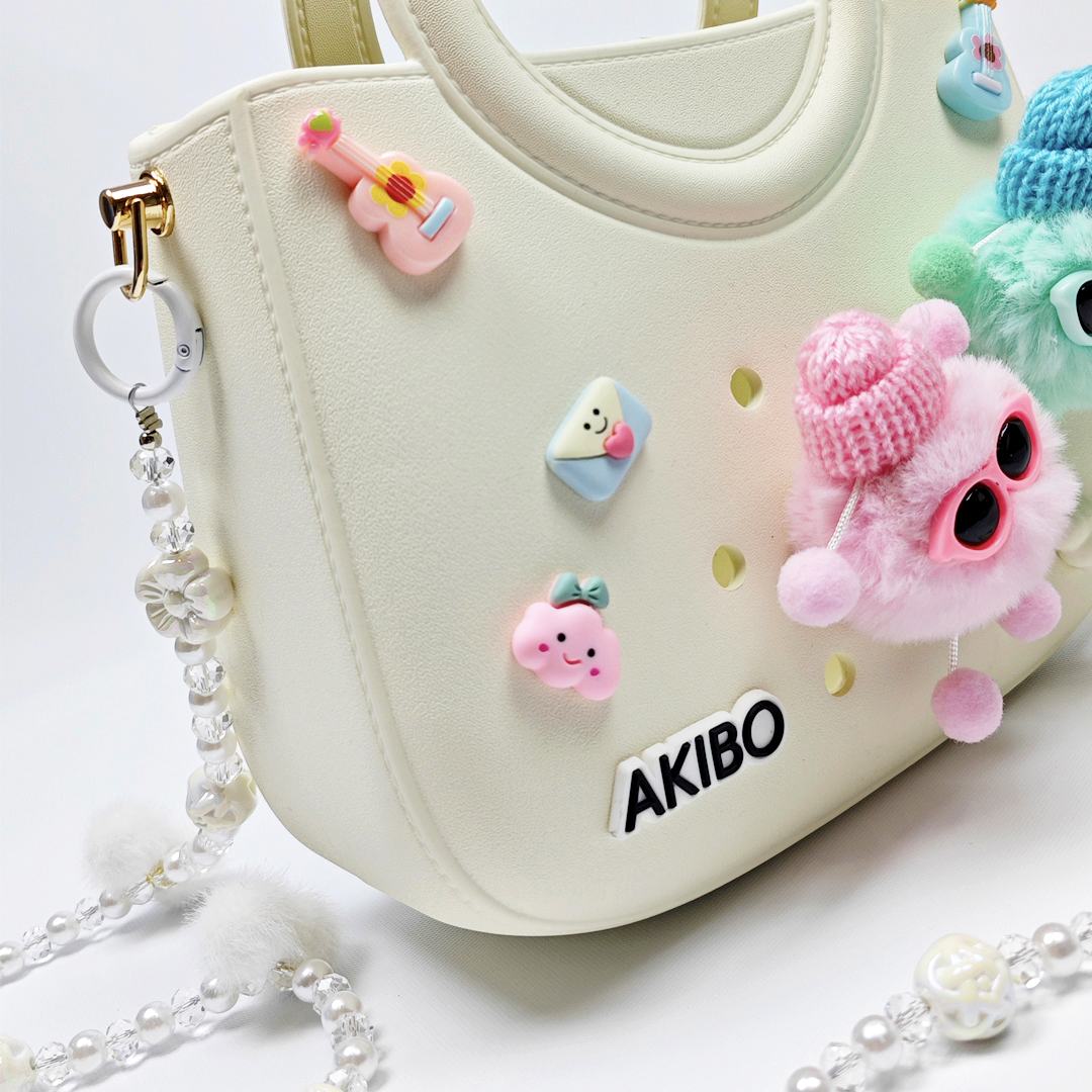 AKIBO滿月包-牛奶白/珠光雪羽背帶(肩背手提洞洞包。中性款、輕量、防水) 