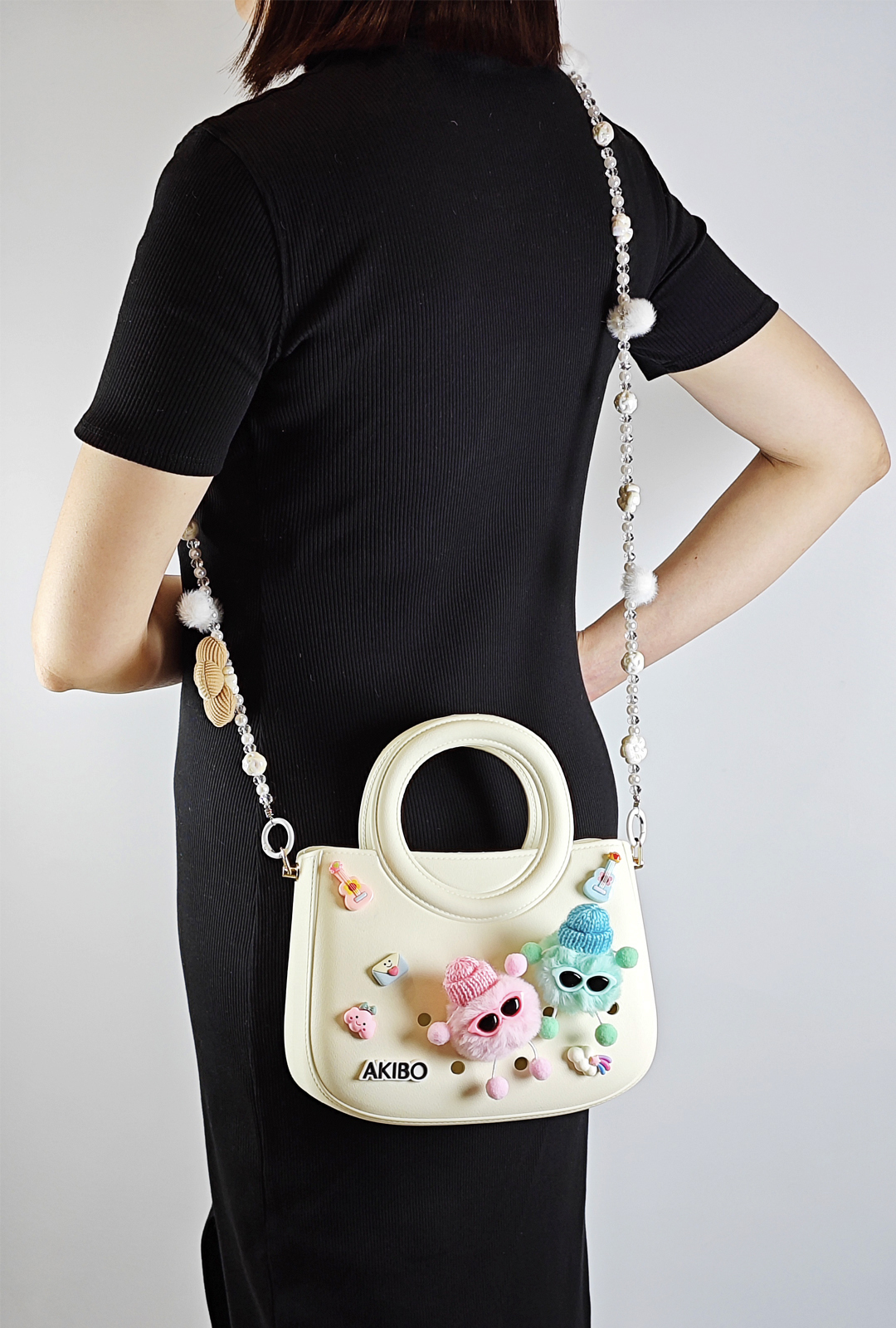 AKIBO滿月包-牛奶白/珠光雪羽背帶(肩背手提洞洞包。中性款、輕量、防水) 