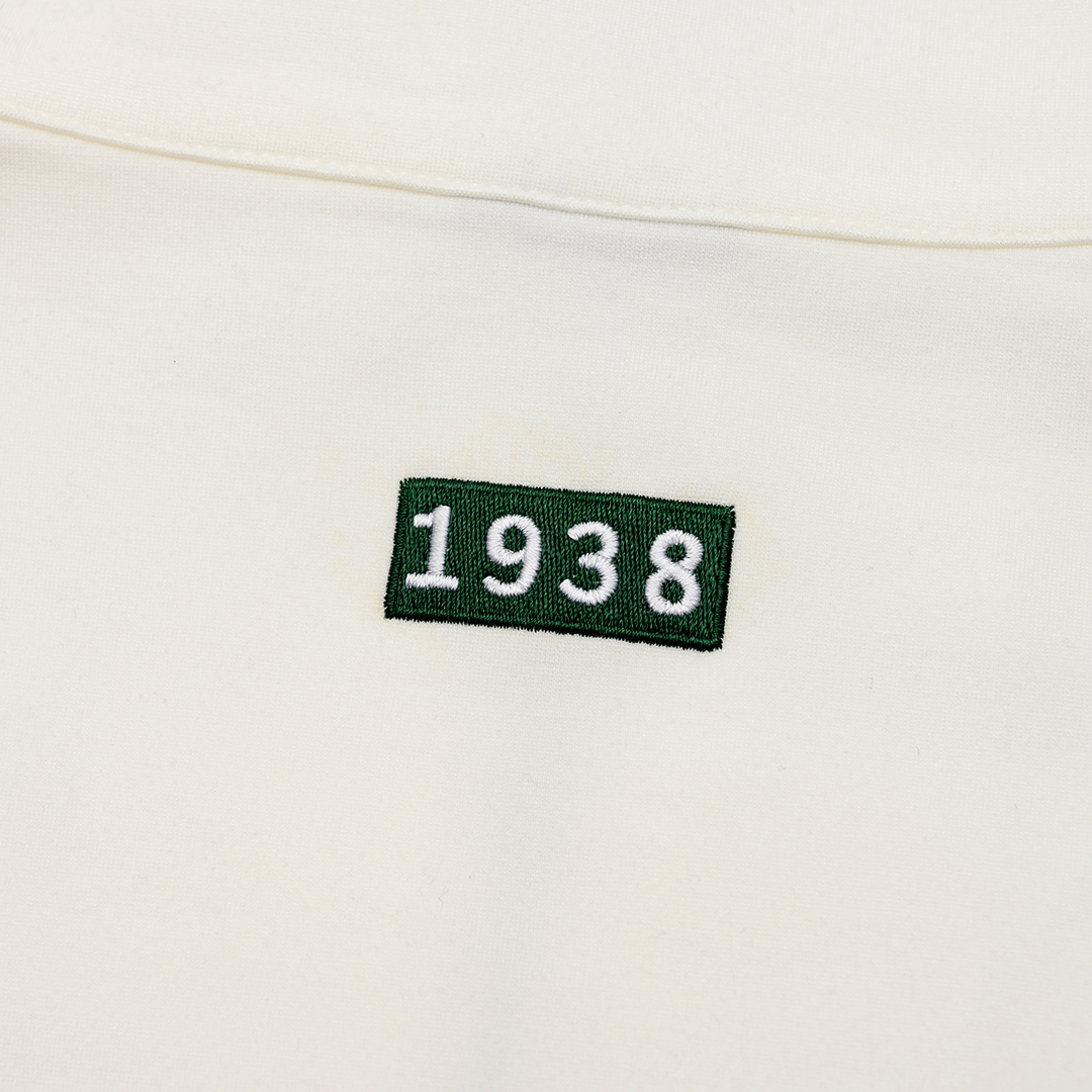 KANGOL袋鼠小Logo女款半開襟上衣-白