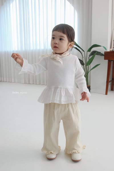 bebe nine07 (65-115) 3色荷葉裙擺上衣2