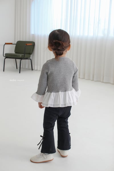 bebe nine07 (65-115) 3色荷葉裙擺上衣7