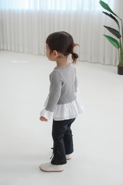 bebe nine07 (65-115) 3色荷葉裙擺上衣8