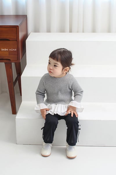 bebe nine07 (65-115) 3色荷葉裙擺上衣9