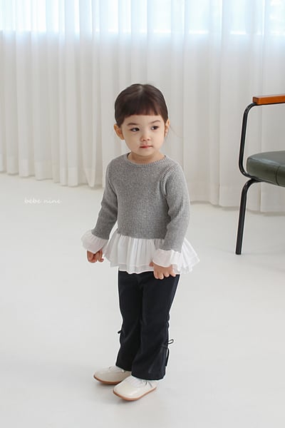 bebe nine07 (65-115) 3色荷葉裙擺上衣10