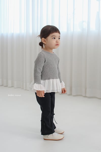 bebe nine07 (65-115) 3色荷葉裙擺上衣6