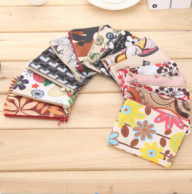 牛津布零錢包 12*9.5 可當暖暖包袋(不挑款)1