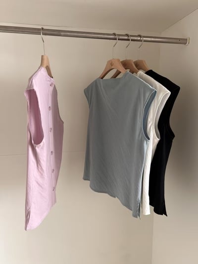 T03 不對稱式肩領排釦衣3