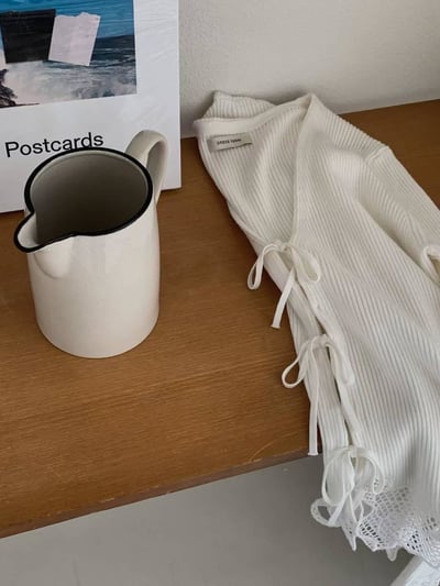 緹花造型綁帶針織上衣1