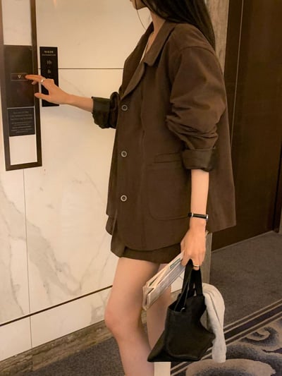 簡約刀領排釦雙口袋風衣外套9