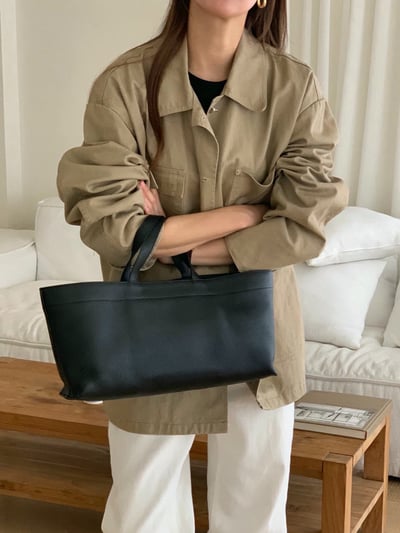 口袋造型落肩長版風衣外套7