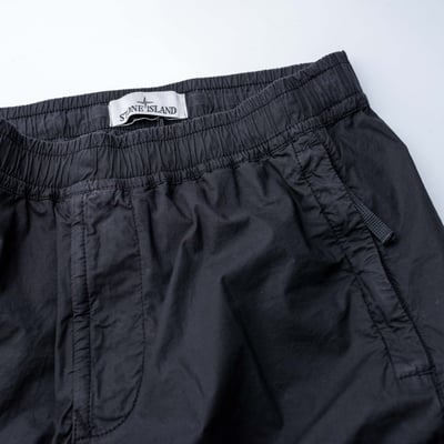 Stone Island 彈性纖維縮口錐形褲 黑4
