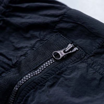 Stone Island 標準版型金屬尼龍長褲 黑6