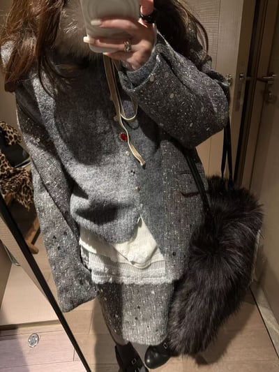 針織毛衣鑽扣不規則開衫3