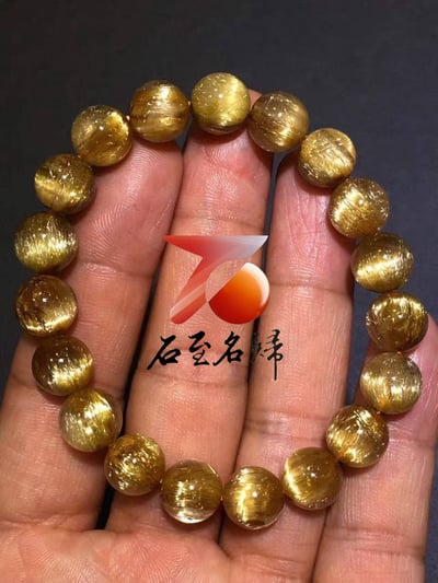 純天然巴西鈦晶順髮貓眼10.5mm手鍊   重32.8克5