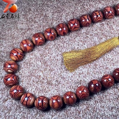 臻藏 海南黃花梨野生料 X紋對眼鬼臉35mm×29+1顆 重量487克2