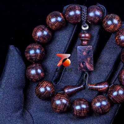 海南黃花梨 紫油梨沉水老料 爆滿鳳尾水波瘤疤花15mm手珠 重33.1公克2