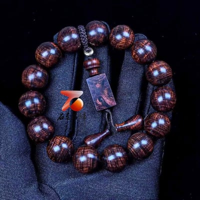 海南黃花梨 紫油梨沉水老料 爆滿鳳尾水波瘤疤花15mm手珠 重33.1公克4