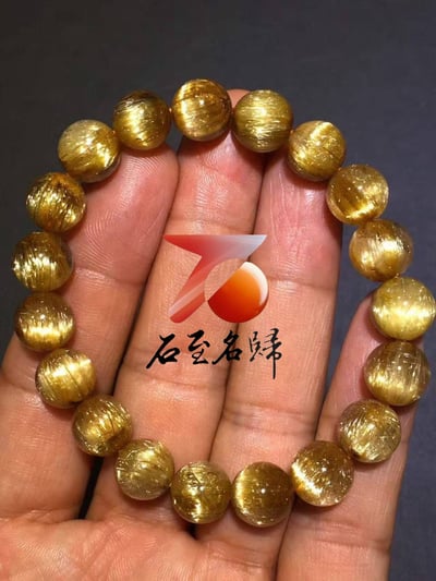 純天然巴西鈦晶順髮貓眼10.5mm手鍊   重32.8克4