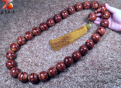 臻藏 海南黃花梨野生料 X紋對眼鬼臉35mm×29+1顆 重量487克5