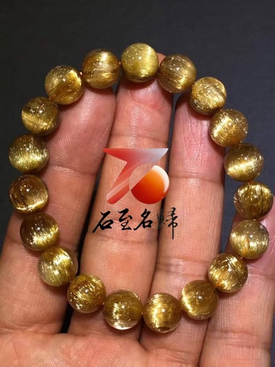 純天然巴西鈦晶順髮貓眼10.5mm手鍊   重32.8克6