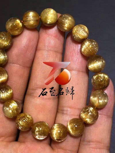 純天然巴西鈦晶順髮貓眼10.5mm手鍊   重32.8克9