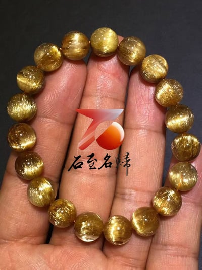 純天然巴西鈦晶順髮貓眼10.5mm手鍊   重32.8克3