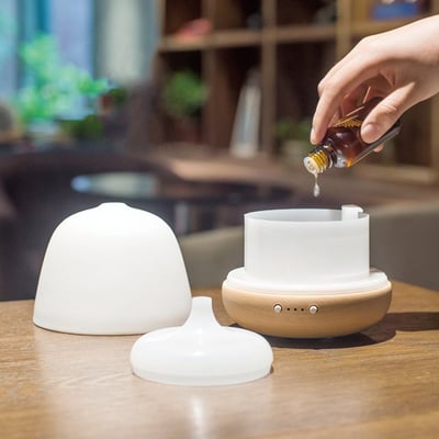 《白玉陶瓷實木底座香薰機》180ml7