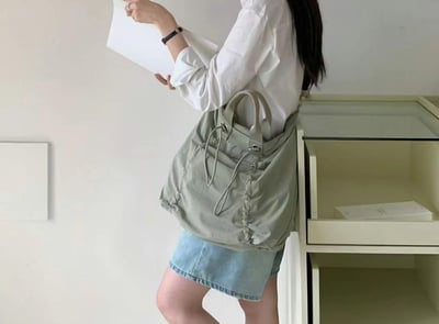 韓國TRO人氣休閒通勤抽繩手拿側背托特包5