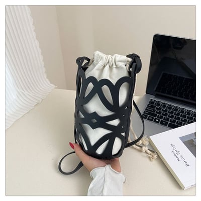 小眾設計感鏤空圓桶抽繩斜背包 輕巧百搭水桶包7