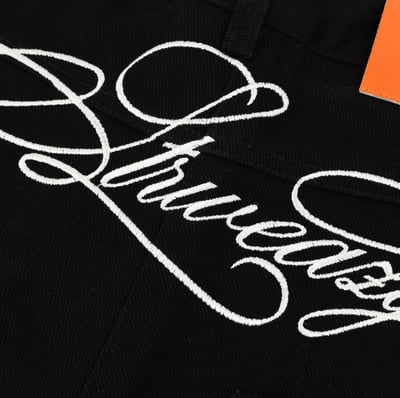 SWE 刺繡字樣牛仔褲13