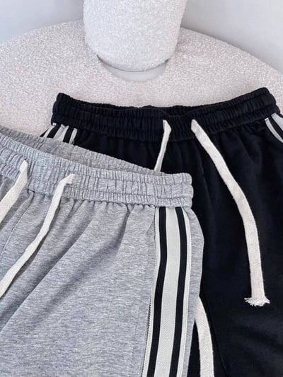 男女適穿-下腳可拉縮口雙線織帶長褲*2色 T7924595