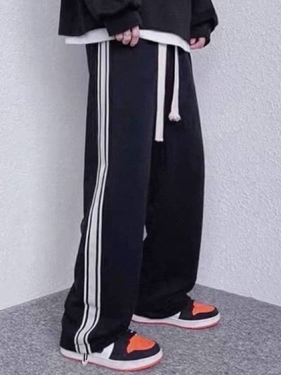 男女適穿-下腳可拉縮口雙線織帶長褲*2色 T7924593