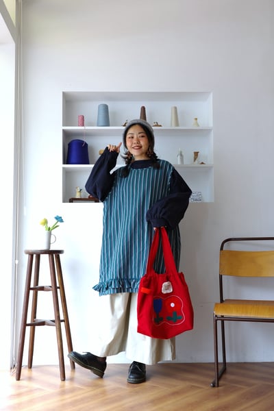 𓏭木耳邊拼接下擺鬆身直紋長背心11