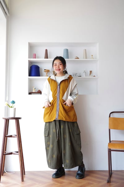 𓏭圖騰織帶色塊拼接連帽風衣背心3