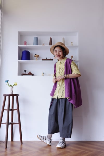 斜扣不對稱下擺抽鬚開襟背心2