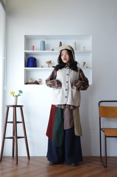 𓏭棒球領混織點圓弧下擺背心9