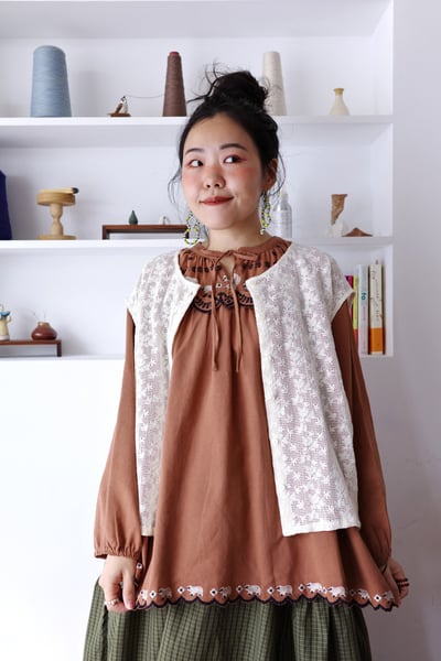 𓏭樹葉織紋下擺壓折針織背心10